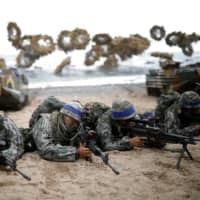 South Korean Marines take part in a joint landing drill with U.S. forces in Pohang in April 2017.  | REUTERS