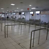 The interior of Mitiga airport terminal is empty after an airstrike in Tripoli in April. | REUTERS