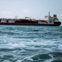 The Stena Impero, a British-flagged vessel owned by Stena Bulk, is seen off the coast of Bandar Abbas, Iran, in August. | WEST ASIA NEWS AGENCY / VIA REUTERS