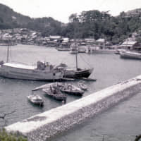 Days gone by: Shiraishi Island\'s port in the 1950s. Motorized boats came to the area in the 1930s, which led to the island\'s residents changing the way they fished. | COURTESY OF               SHIRAISHI ARCHIVES