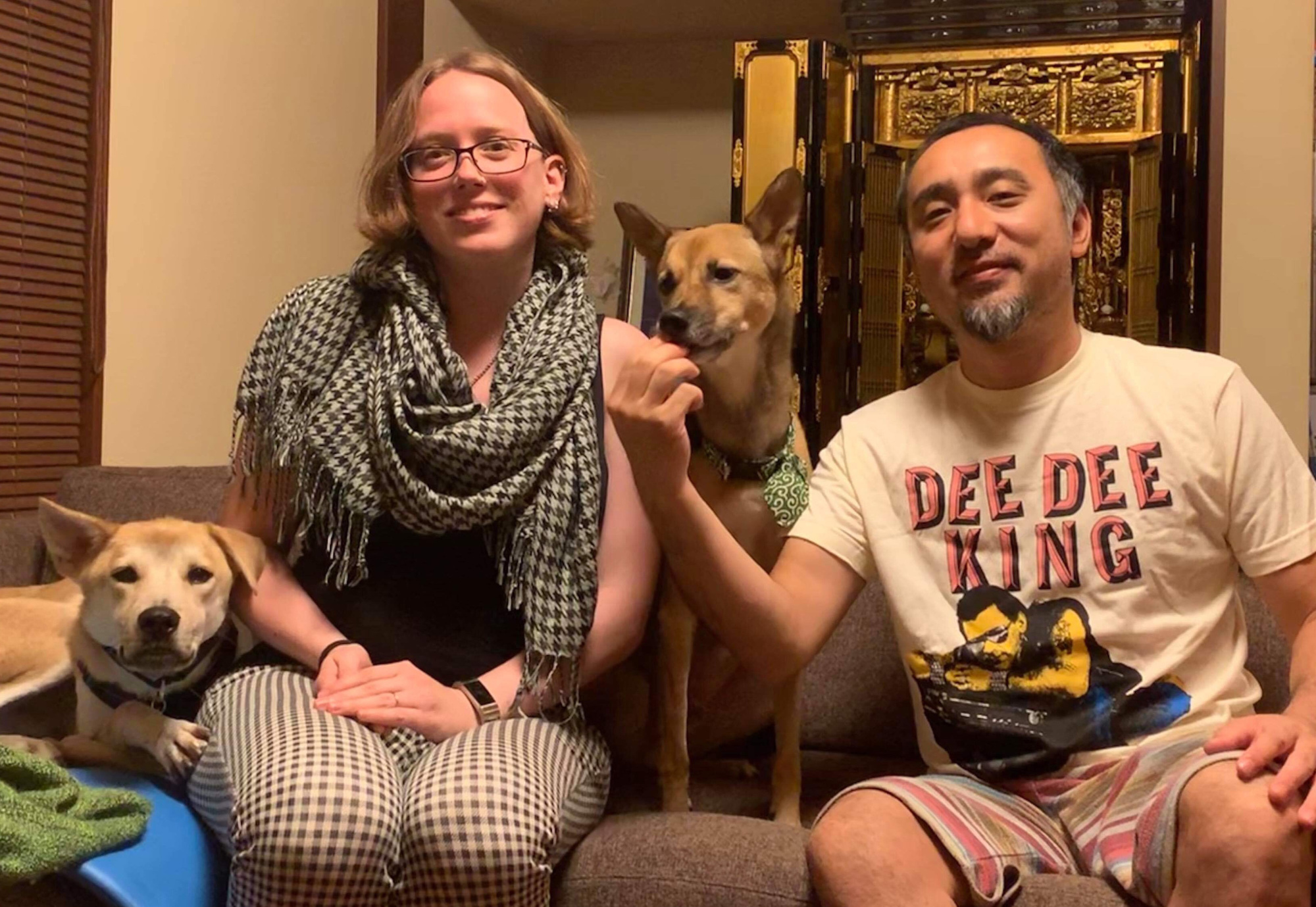 Our house: Rebecca and Hiroaki Takeuchi  pose with their dogs McCoy (left) and Xen (center). | COURTESY OF THE TAKEUCHI FAMILY