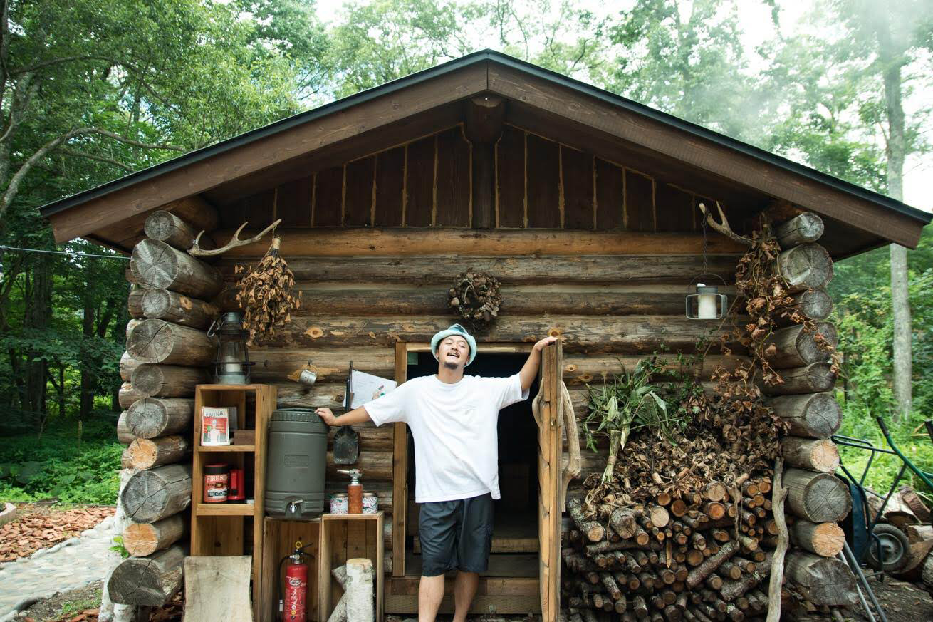 Yuichi Noda at at guesthouse Lamp's Finnish log sauna in Nagano Prefecture. | COURTESY OF LAMP