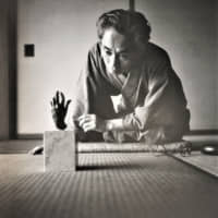 Yasunari Kawabata looking at Auguste Rodin\'s \"Hand of 		a Woman\" | TADAHIKO HAYASHI