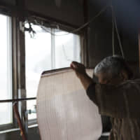 Good things take time: When a sheet is complete, water is drained from the paper and it is left to stand overnight, then dried in the sun. | MASASHI KUMA