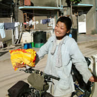 Personal journey: Mio Yamada during her 5,000-kilometer cycle from Kenya to South Africa in 2004 to 2005. | COURTESY OF COOK JAPAN PROJECT