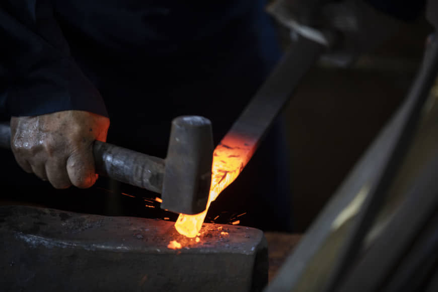 Establishing a rhythm: One of the characteristic Echizen ways of forming a sickle blade is called maikozuchi (dancing mallet) because of the way the mallet is wielded to shape the arc of the blade.