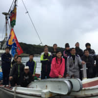 Chika Tsubouchi (front, center) leads groups of fishing fleets. | GHIBLI