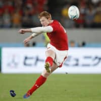 Wales flyhalf Rhys Patchell kicks a penalty during his team\'s victory over Australia on Sunday at Tokyo Stadium. Wales won 29-25 | AFP-JIJI