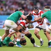 Japan\'s Kazuki Himeno carries the ball against Ireland in a Rugby World Cup Pool A match on Saturday at Shizuoka Stadium Ecopa. | REUTERS