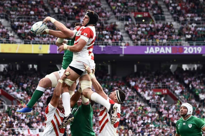 Japan’s lock James Moore jumps for the ball in a lineout. | AFP-JIJI