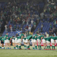 Ireland\'s players bow to the crowd after their match against Scotland on Sunday in Yokohama. | AP