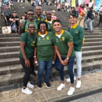 South African fans visiting from Pretoria soak up the atmosphere at International Stadium Yokohama before the Springboks\' Rugby World Cup game against New Zealand on Saturday. | ANDREW MCKIRDY