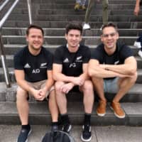 Dutch All Blacks fans (from left) Pascal Rijkers, Ben Wijnen and Johnny Nas show their colors ahead of Saturday\'s Rugby World Cup game against South Africa in Yokohama. | ANDREW MCKIRDY