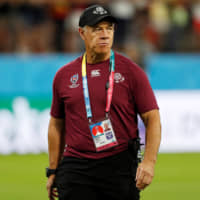 Georgia coach Milton Haig stands on the field before Monday\'s match against Wales at City of Toyota Stadium. | REUTERS