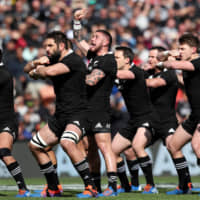 All Blacks players perfrom the haka during a test match against Tonga in Hamilton, New Zealand, on Sept. 7. | AFP-JIJI