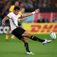 Fiji\'s Ben Volavola scores a penalty against Australia in a Rugby World Cup Pool D match on Saturday at Sapporo Dome. | REUTERS