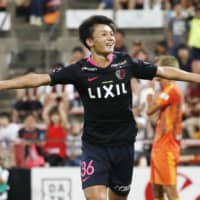 Kashima\'s Ayase Ueda celebrates after scoring his team\'s third goal against Shimizu on Sunday at IAI Stadium Nihondaira. | KYODO