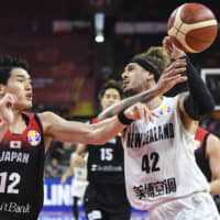 Japan\'s Yuta Watanabe (left) defends New Zealand\'s Issac Fotu during their game at the FIBA World Cup on Saturday in Dongguan, China. | AP