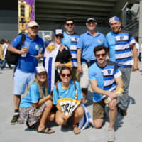 Francisco Berchesi (front, right) and his family pose for a photo at Kumagaya Rugby Stadium on Sunday. Berchesi\'s brother Felipe is the regular flyhalf for the Uruguayan national team. | KAZ NAGATSUKA