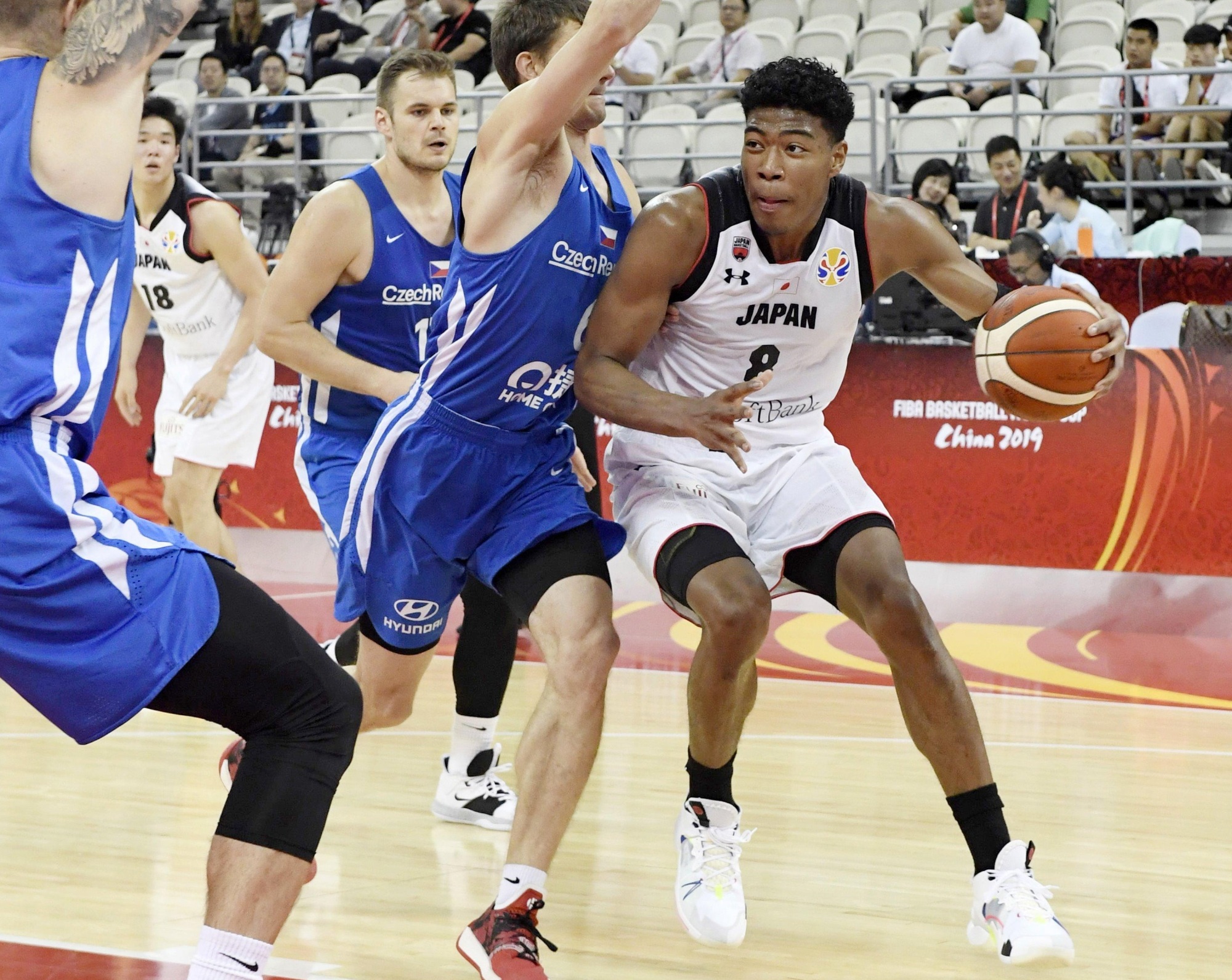 Japan's Rui Hachimura encounters tight defense during second-quarter action against the Czech Republic in a FIBA World Cup Group E contest on Tuesday in Shanghai. | KYODO