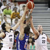 Japan\'s Yuta Watanabe (left) and Nick Fazekas (right) attempt to block a shot by the Czech Republic\'s Ondrej Balvin on Tuesday in Shanghai. | REUTERS