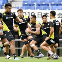Japan fullback William Tupou runs with the ball during practice on Thursday at Kumagaya Rugby Stadium in Saitama Prefecture. | KYODO