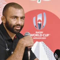 Japan captain Michael Leitch speaks at a news conference in Tokyo on Monday ahead of the team\'s 2019 Rugby World Cup opener against Russia on Friday. | KYODO