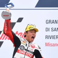 Tatsuki Suzuki celebrates on the podium after winning the San Marino Moto3 Grand Prix race at the Misano World Circuit Marco Simoncelli near Rimini, Italy. | AFP-JIJI