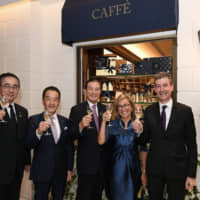 Paola Faccioli (second from right), CEO of Pasticceria Cova poses with, from far left, Tokyu Corporation Executive General Manager of Retail Business Headquarters Masahiro Horie; Tokyu Corp. President and Representative Director Kazuo Takahashi; Tokyu Group Chairman of the Board, Representative Director Chairman Hirofumi Nomoto; and President of LVMH Moet Hennessy-Louis Vuitton Japan K.K. Norbert Leuret, during a reception at Cafe Cova Milano GINZA SIX for the grand opening of the new flagship store in Ginza on Sept. 10. | YOSHIAKI MIURA