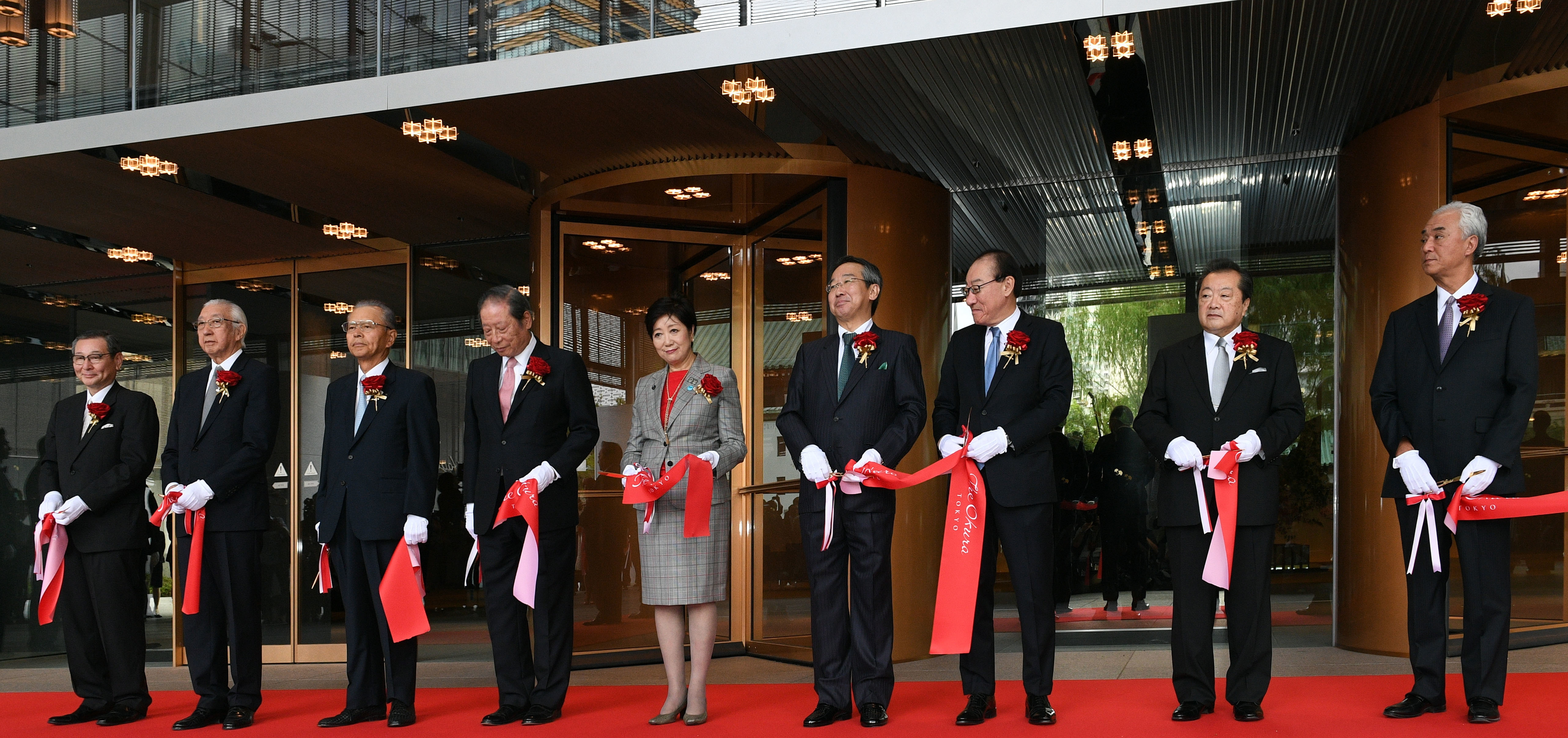 The Okura Tokyo, the new flagship hotel of Hotel Okura Co., during the ribbon-cutting ceremony. From left: President and Representive Director of Hotel Okura Tokyo Masaharu Naruse; Architect Yoshio Taniguchi; Chairman of the Board of Taisei Corp. Takashi Yamauchi; Chairman of Hotel Okura Yoshihiko Okura; Tokyo Gov. Yuriko Koike; President and Representative Director of Hotel Okura Toshihiro Ogita; President of Nippon Steel Kowa Real Estate Co. Yasuhiko Imaizumi; Chairman of Hotel Okura Tokyo Masaki Ikeda; and Senior Managing Director, Representative Director and General Manager of Hotel Okura Tokyo Shinji Umehara, at Toranomon, Minato Ward on Sept. 12. |   YOSHIAKI MIURA