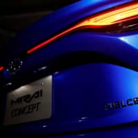 A fuel cell-powered Toyota Mirai is displayed at the Tokyo Motor Show on Thursday. | REUTERS