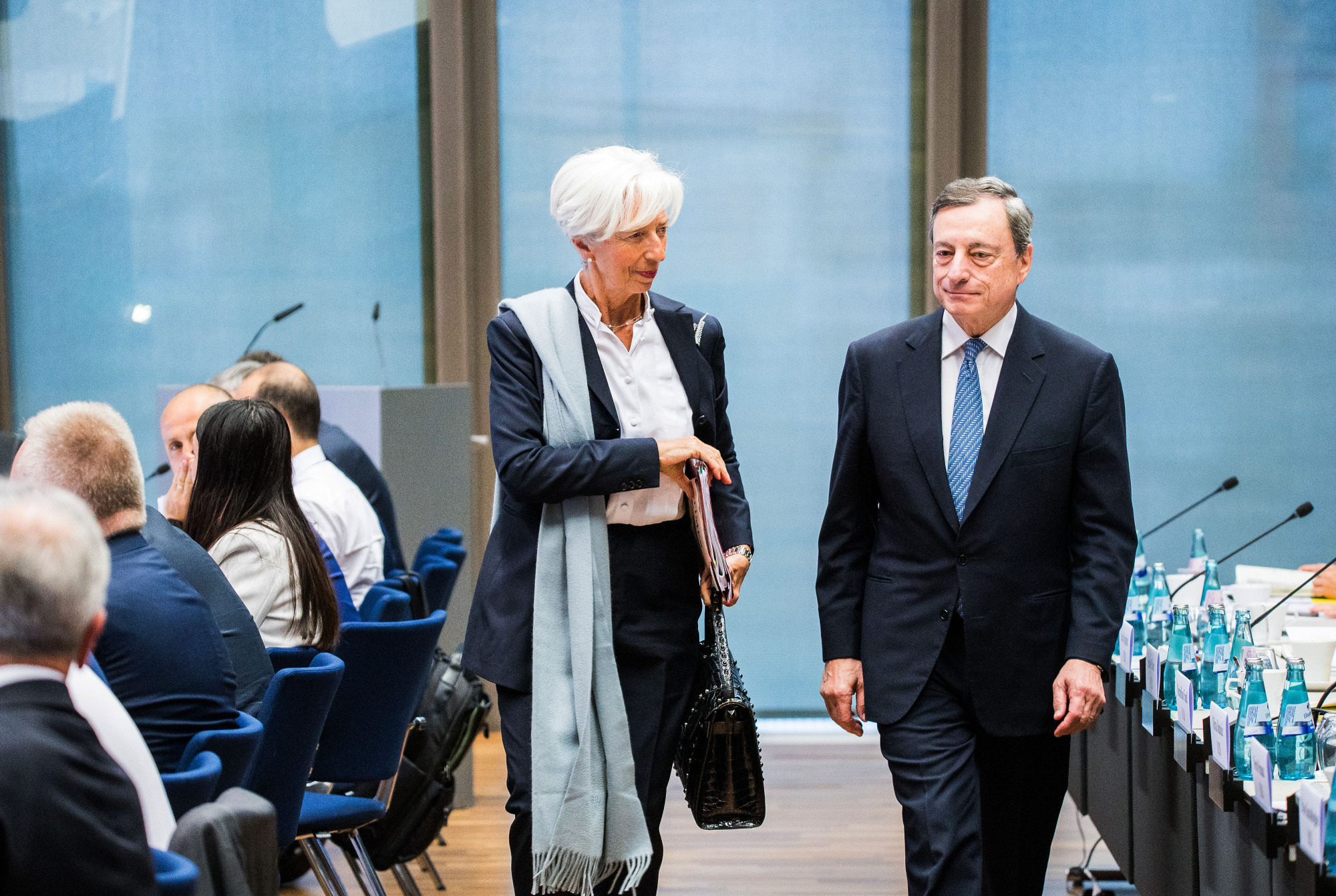 IMF Managing Director Christine Lagarde and European Central Bank President Mario Draghi arrive at a conference on the economies of the central, eastern and southeastern European nations in June at the ECB headquarters in Frankfurt, Germany. | BLOOMBERG