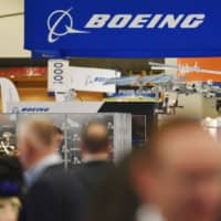 The Boeing logo is seen at its stand during the the 70th annual International Astronautical Congress at the Walter E. Washington Convention Center in Washington Tuesday. | AFP-JIJI