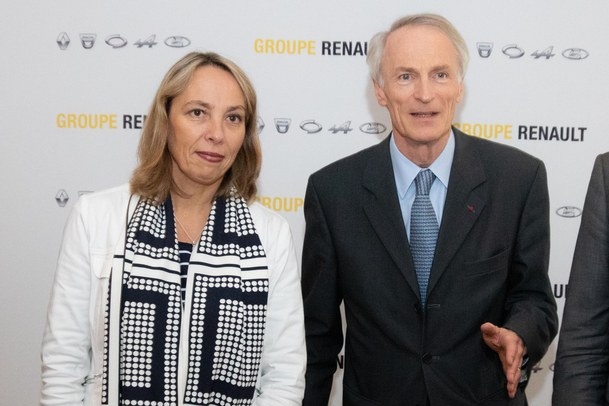 Clotilde Delbos, interim CEO of Renault SA (left), and Jean-Dominique Senard, chairman of Renault, pose ahead of a news conference at the automaker's headquarters in the Boulogne Billancourt district of Paris on Friday. | BLOOMBERG