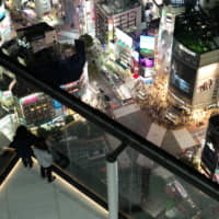 A night view from the rooftop of Shibuya Scramble Square is seen Thursday during a media preview for the new facility, slated to open Nov. 1. The 230-meter building is the tallest in the bustling Tokyo district.  | RYUSEI TAKAHASHI