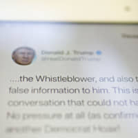 A tweet by U.S. President Donald Trump is displayed on a tablet computer in this arranged photograph taken in Arlington, Virginia, Tuesday. Trump on Twitter blamed Federal Reserve Chairman Jerome Powell and his colleagues at the central bank for hurting manufacturing companies after a key gauge of the industry\'s health posted its weakest reading since the end of the last recession. | BLOOMBERG