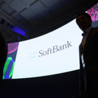 The SoftBank Group Corp. logo is displayed on a screen during the SoftBank World 2019 event in Tokyo in July. | BLOOMBERG