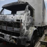 A gutted truck is seen after an armed gang robbed a securities company at the Viracopos airport freight terminal, in Campinas near Sao Paulo Thursday. | REUTERS