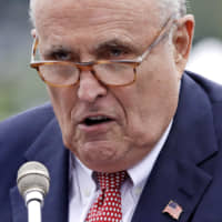 Rudy Giuliani, an attorney for President Donald Trump, speaks last year in Portsmouth, New Hampshire. As Giuliani was pushing Ukrainian officials in the spring of 2019 to investigate one of Donald Trump\'s main political rivals, a group of individuals with ties to the president and his personal lawyer were also active in the former Soviet Republic. | AP
