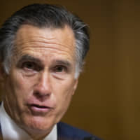 Senate Foreign Relations Committee member Sen. Mitt Romney questions witness James Jeffrey, special representative for Syria Engagement and special, envoy to the Global Coalition to Defeat Islamic State during a committee hearing on assessing the impact of Turkey\'s offensive in northeast Syria, on Capitol Hill in Washington Tuesday. | AP