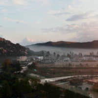 The sun rises over the Mount Kumgang resort in North Korea in October 2010. | REUTERS