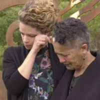 In this image taken from video, British High Commissioner Laura Clarke wipes away a tear after hugging a Maori elder during a visit to the town of Gisborne, in New Zealand, on Wednesday. Clarke expressed \"regret\" that British explorers killed some of the first indigenous Maori they met 250 years ago. She met with Maori tribal leaders in the town as New Zealand marked the anniversary of Capt. James Cook and the crew of his ship Endeavour\'s arrival in 1769. | AP