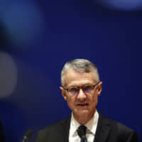 Paris prosecutor Jean-François Ricard gives a press conference at the Paris courthouse Saturday. French prosecutors opened an investigation Friday that treats the fatal knife attack that a civilian employee carried out at Paris police headquarters as a potential act of terrorism. The longtime police employee stabbed four colleagues to death Thursday before he was shot and killed. | AP