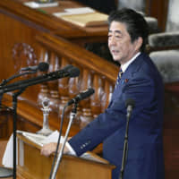 Prime Minister Shinzo Abe gives a speech during the extraordinary Diet session that opened on Friday. | KYODO