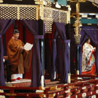 Emperor Naruhito delivers the speech proclaiming his enthronement from the takamikura imperial throne Tuesday at the Imperial Palace in Tokyo. | KYODO