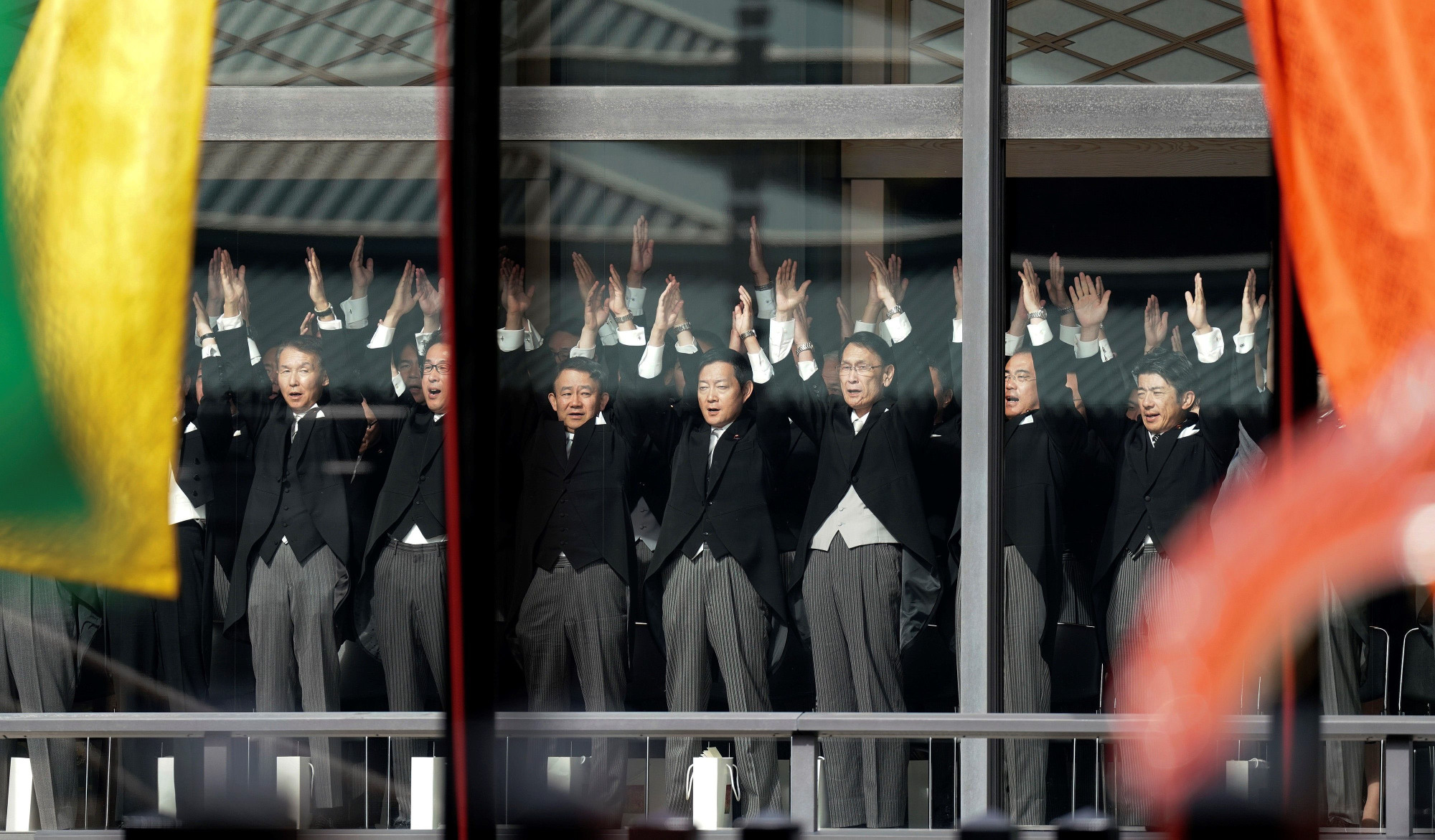 Officials shout banzai cheers for Emperor Naruhito and Empress Masako during the enthronement ceremony. | AFP-JIJI