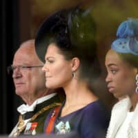 Swedish King Carl XVI Gustaf (left) and his daughter, Crown Princess Victoria (center), attend the enthronement ceremony. | POOL / VIA AFP-JIJI