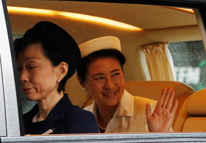 Empress Masako arrives at the Imperial Palace in Tokyo on Tuesday morning for the enthronement ceremony of Emperor Naruhito. | REUTERS