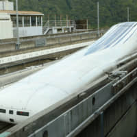 A prototype of a Central Japan Railway Co. maglev train is unveiled to the media at the railway operator\'s experimental laboratory in Tsuru, Yamanashi Prefecture, on Thursday. | KYODO