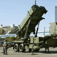 The Air Self-Defense Force\'s Patriot Advanced Capability-3 missile interceptor is shown to the press during a drill in Tokyo on Oct. 9. | KYODO